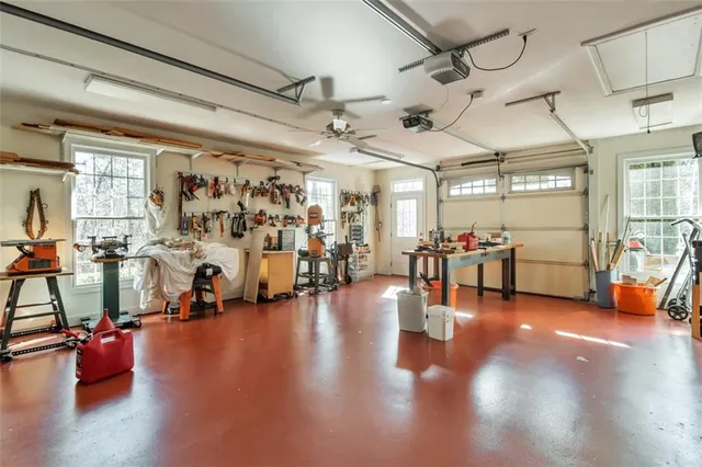 a view of a fountain in front of a house