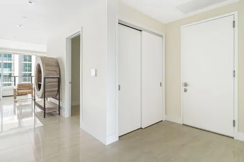 a view of livingroom with furniture and floor to ceiling window