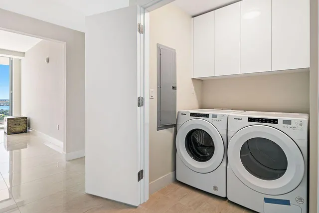 a utility room with dryer and washer