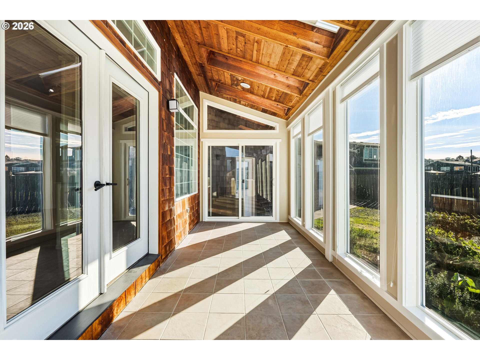 323 Madison Avenue Bandon, OR 97411 - Photo 41 of 43 a view of a porch with a backyard