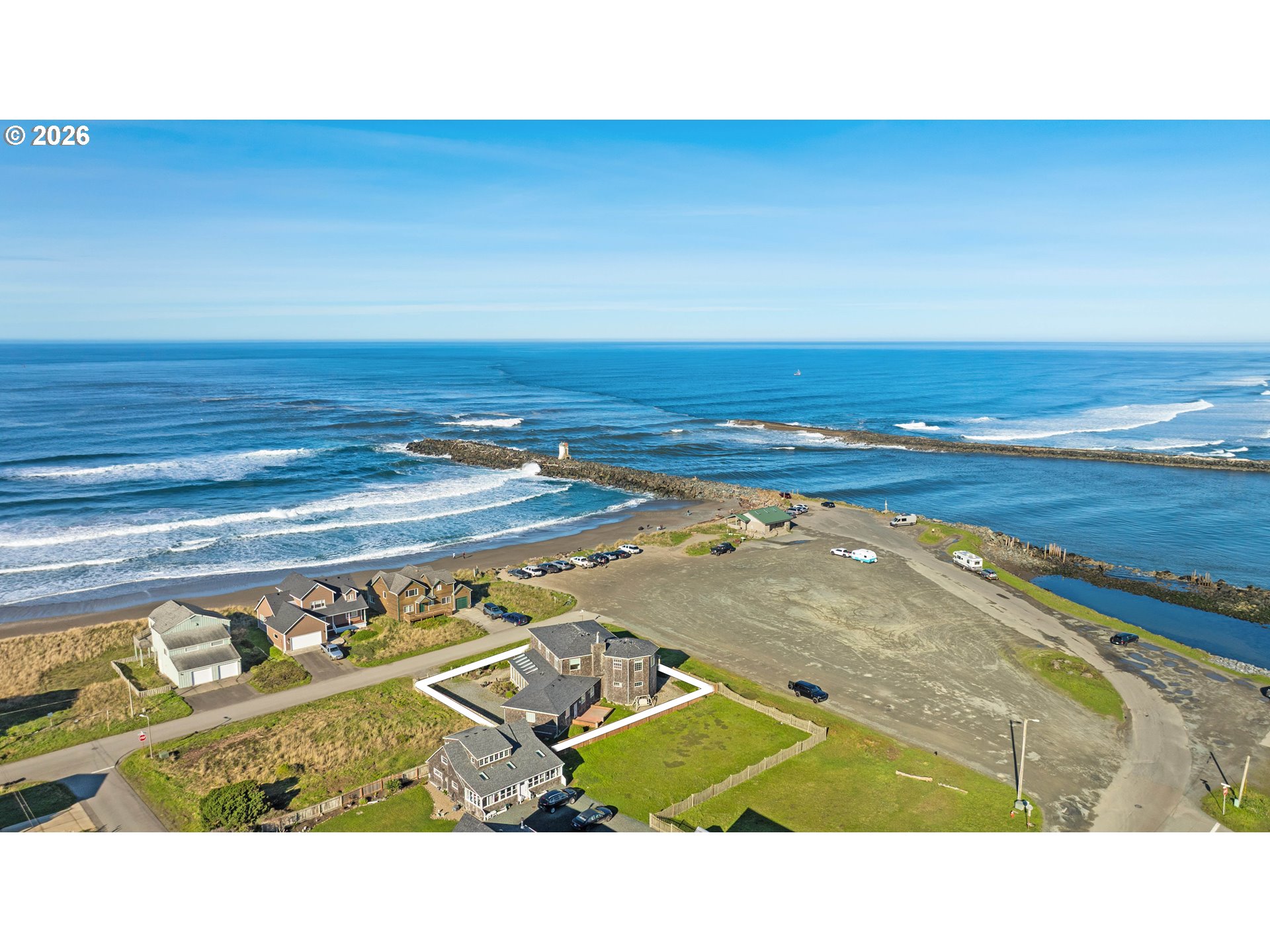 323 Madison Avenue Bandon, OR 97411 - Photo 6 of 43 a black and white photo of a room