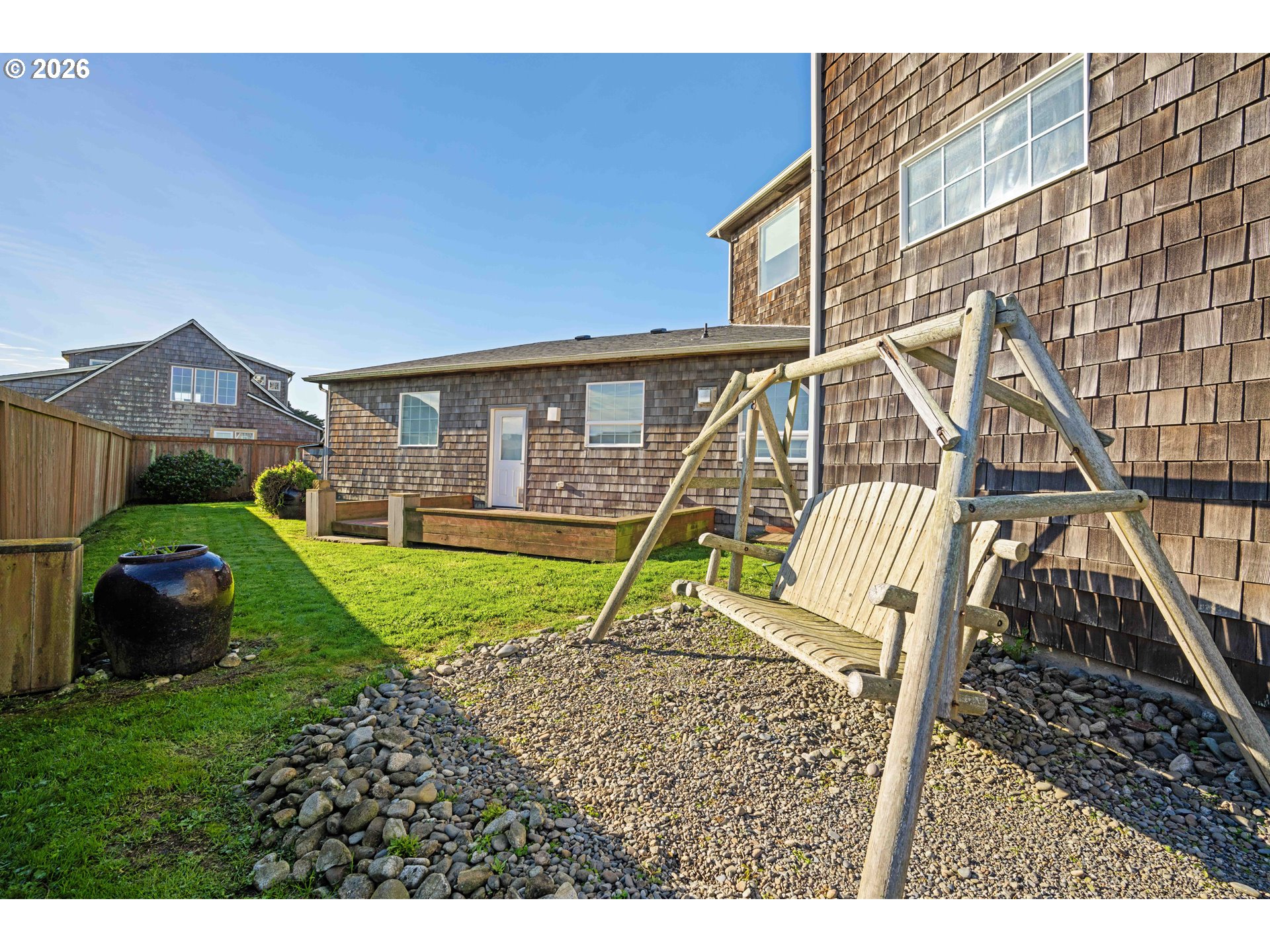 323 Madison Avenue Bandon, OR 97411 - Photo 8 of 43 a view of outdoor space yard deck and patio
