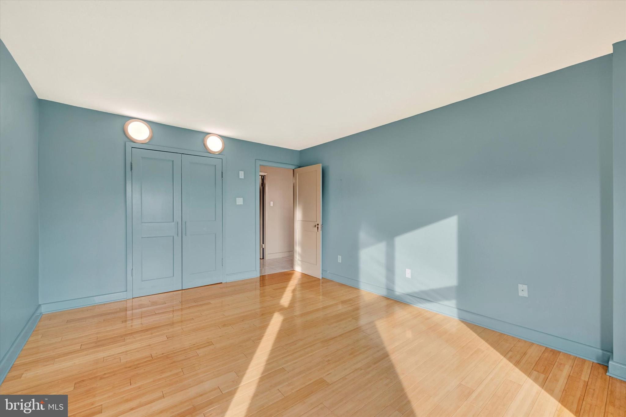 4100 North Charles Street, Unit 609 Baltimore, MD 21218 - Photo 18 of 36 a view of a big room with closet and cabinet