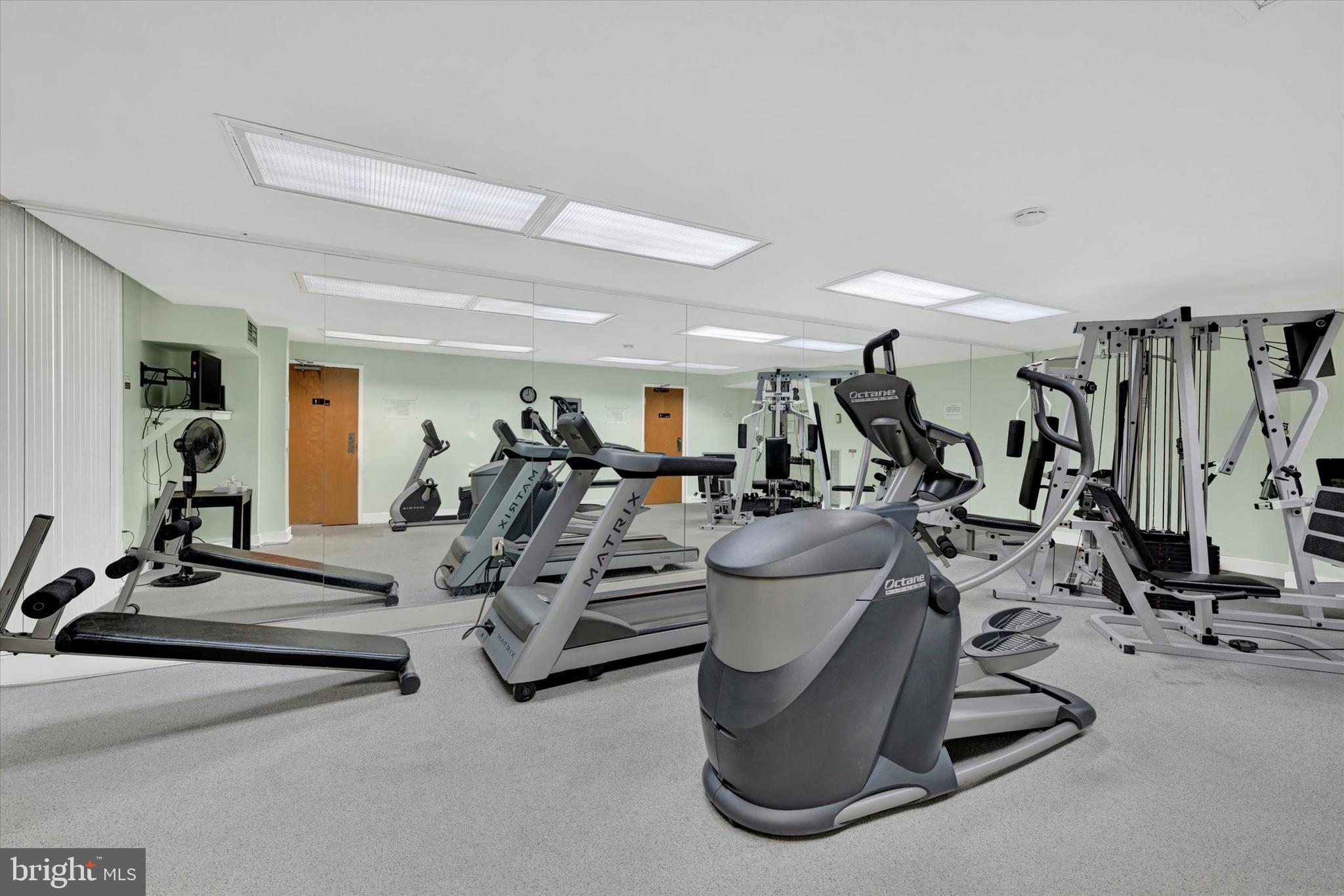 4100 North Charles Street, Unit 609 Baltimore, MD 21218 - Photo 26 of 36 a view of a room with gym equipment