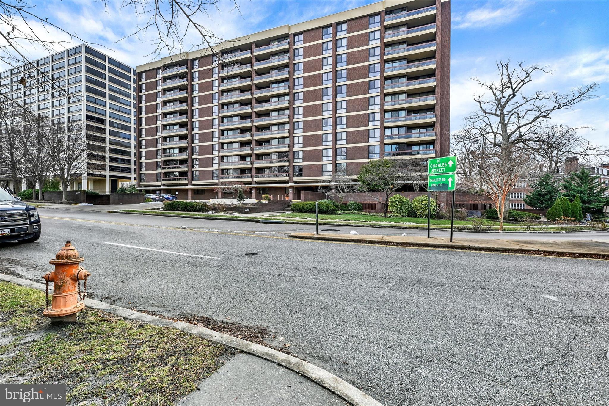 4100 North Charles Street, Unit 609 Baltimore, MD 21218 - Photo 33 of 36 a front view of a building with a street