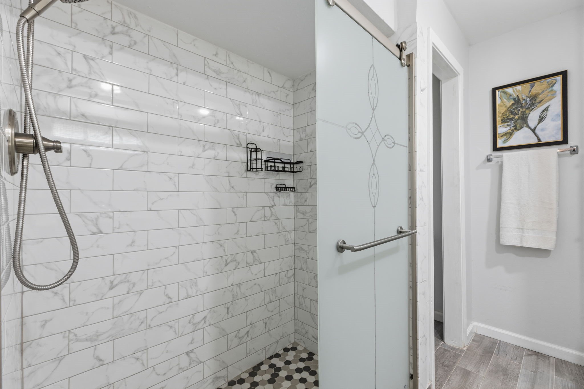5410 Indigo Street Houston, TX 77096 - Photo 19 of 30 Large walk-in shower & Brand-New glass doors (installed 5/11/2026) in primary bathroom.