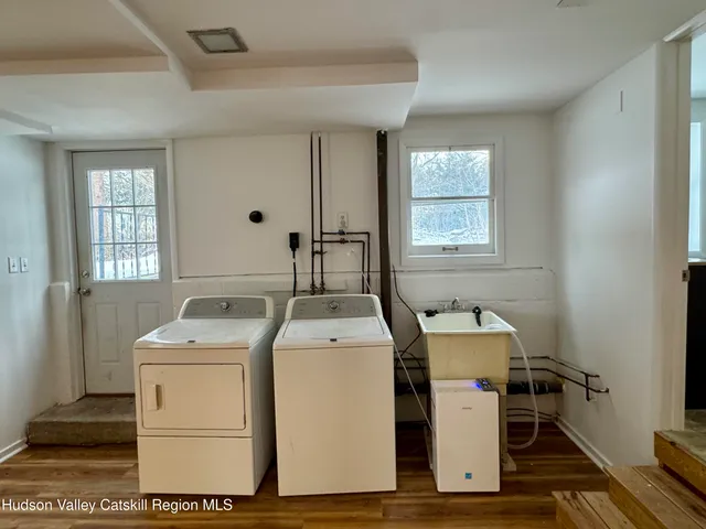 a view of empty room with wooden ceiling