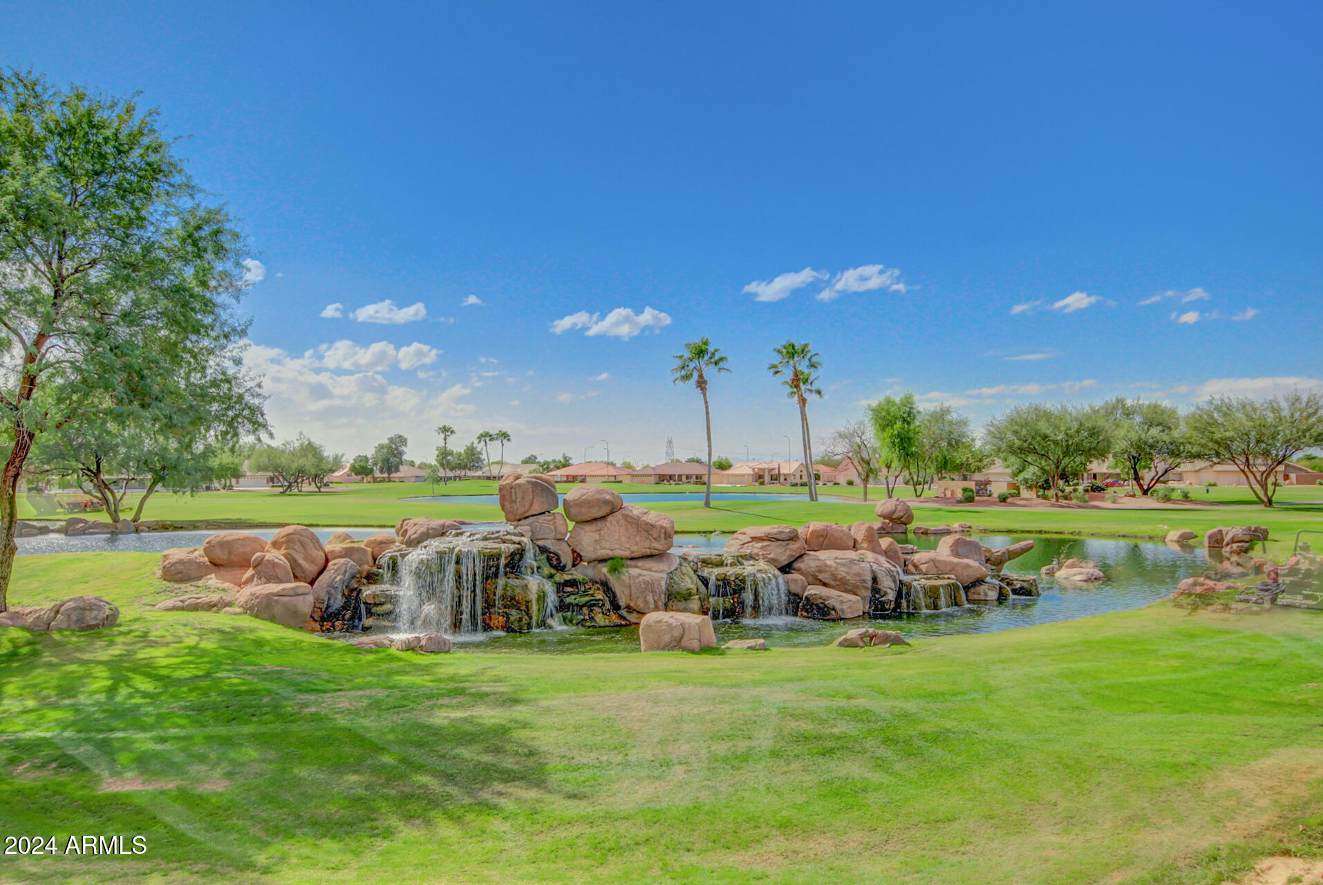 3117 South Signal Butte Road, Unit 508 Mesa, AZ 85212 - Photo 32 of 43 SSV Front Entry Golf Course