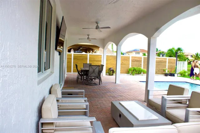 a view of lobby with furniture and floor to ceiling window