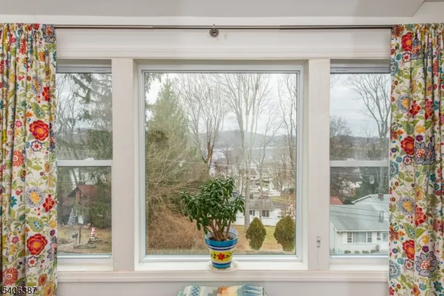 a view of a flower garden from a window