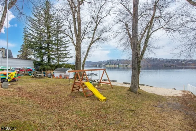 a view of yard with car parked