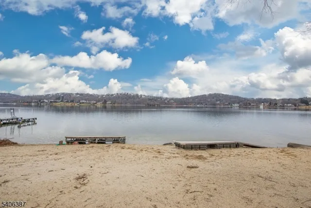 a view of a chair and tables in the patio