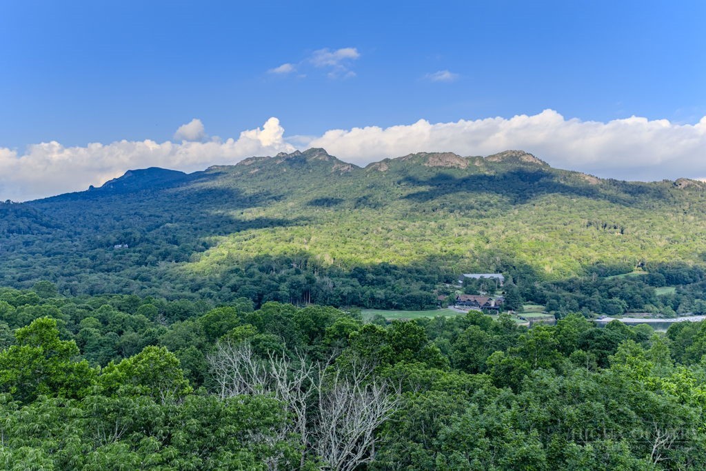 102 Ridge Drive Linville, NC 28646 - Photo 48 of 48 a view of a lush green hillside and a mountain