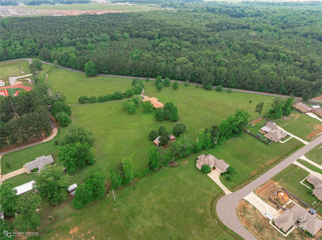 451 North Hazel Street Haughton, LA 71037 - Photo 2 of 13 a view of a lake with a yard