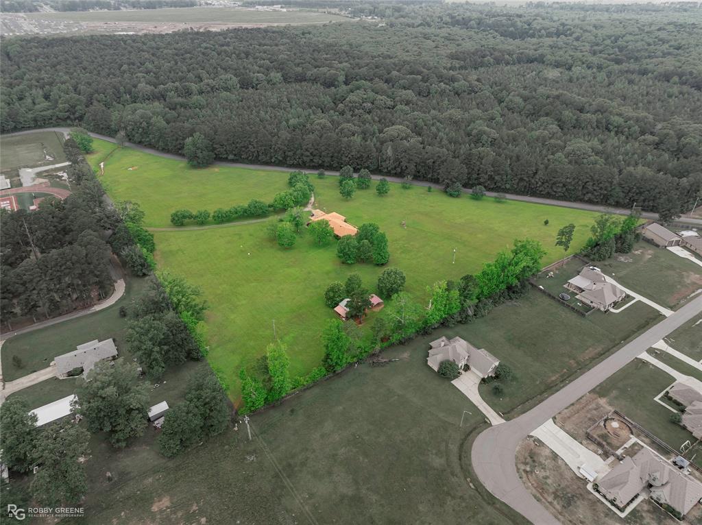 451 North Hazel Street Haughton, LA 71037 - Photo 4 of 13 a view of a lake with a yard