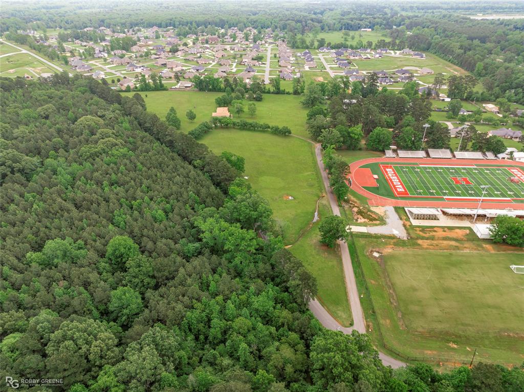 451 North Hazel Street Haughton, LA 71037 - Photo 9 of 13 an aerial view of a residential houses with outdoor space and trees