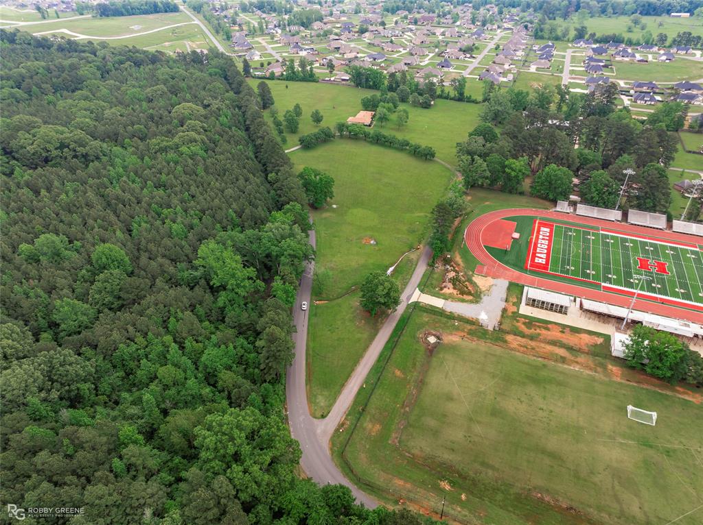 451 North Hazel Street Haughton, LA 71037 - Photo 10 of 13 a view of a swimming pool with a yard