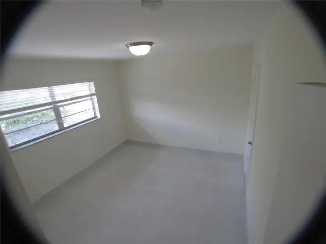 a view of empty room with window