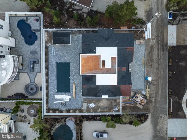 an aerial view of beach and ocean