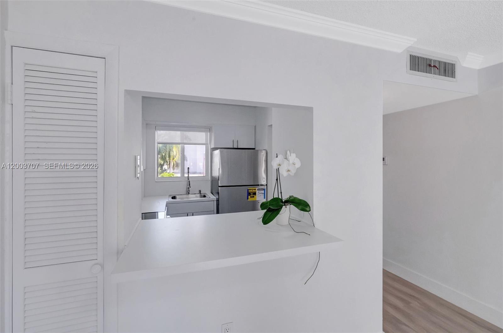 1345 Lincoln Road, Unit 501 Miami Beach, FL 33139 - Photo 14 of 33 a bathroom with a bathtub sink and mirror