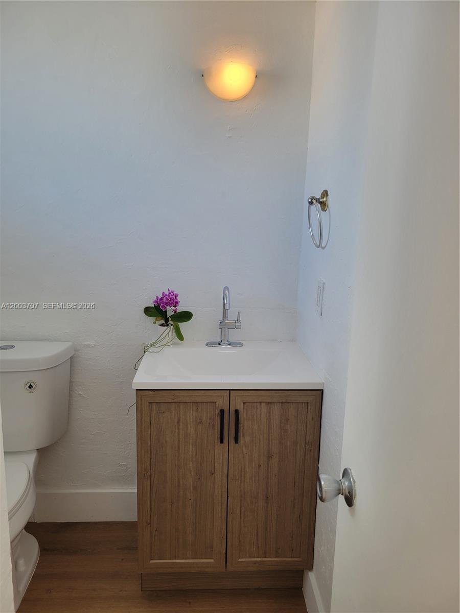 1345 Lincoln Road, Unit 501 Miami Beach, FL 33139 - Photo 24 of 33 a bathroom with a sink and a toilet