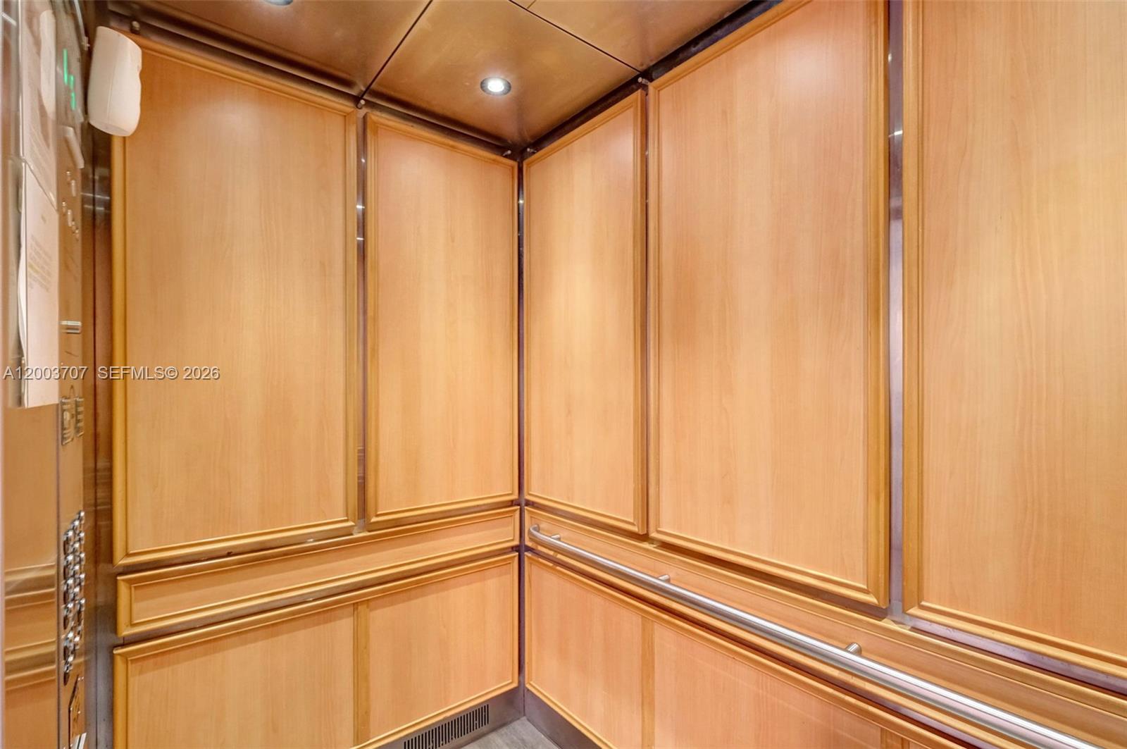 1345 Lincoln Road, Unit 501 Miami Beach, FL 33139 - Photo 28 of 33 a view of a closet with wooden floor