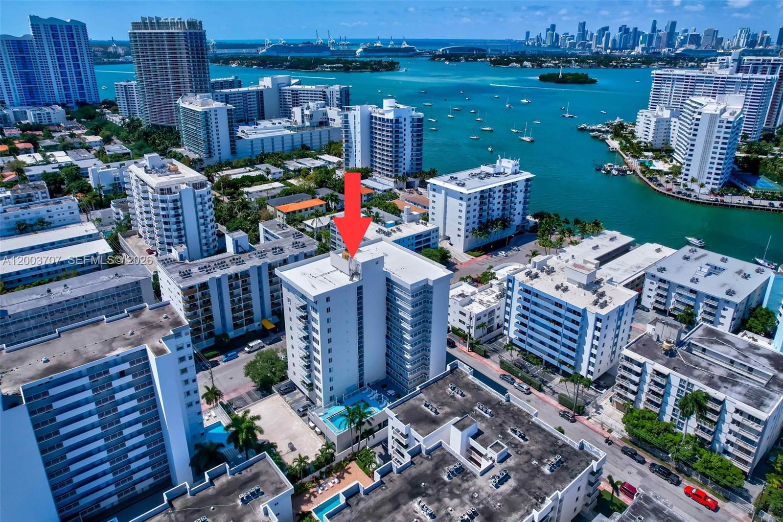 1345 Lincoln Road, Unit 501 Miami Beach, FL 33139 - Photo 31 of 33 an aerial view of a house with a garden and outdoor seating