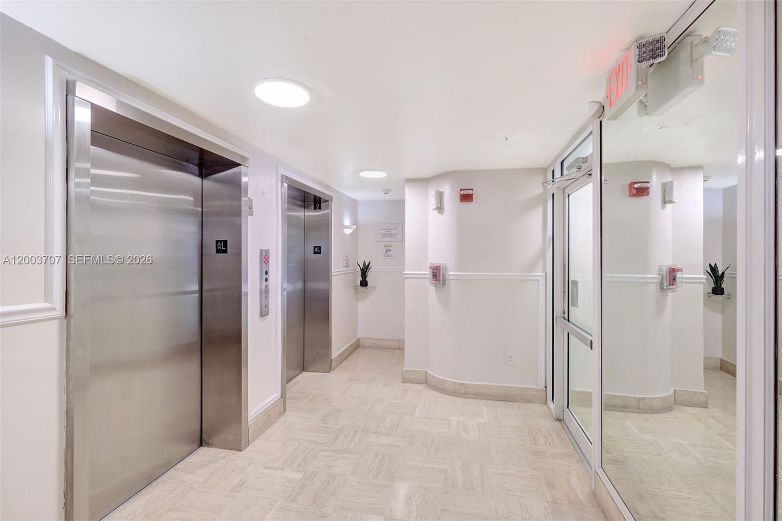 1345 Lincoln Road, Unit 501 Miami Beach, FL 33139 - Photo 6 of 33 a bathroom with a shower and a glass door
