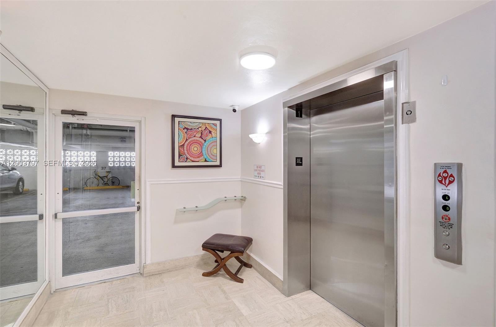 1345 Lincoln Road, Unit 501 Miami Beach, FL 33139 - Photo 7 of 33 a view of a elevator and an empty room