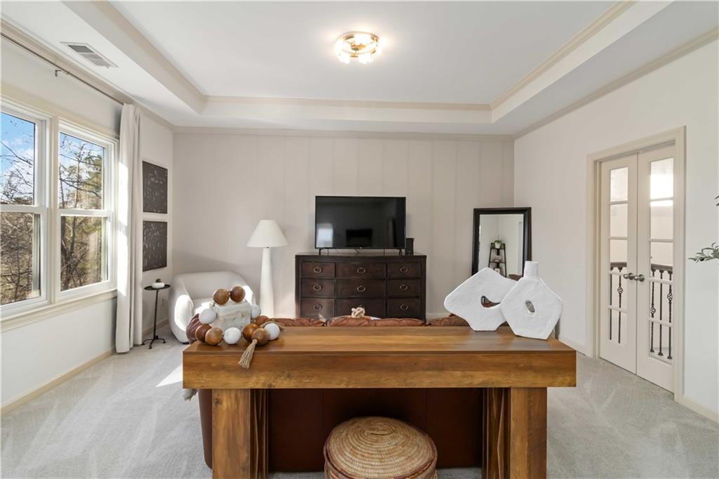 6233 Huntington Ridge Road Mableton, GA 30126 - Photo 24 of 50 a living room with furniture and a flat screen tv