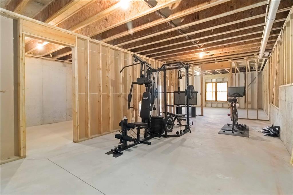 6233 Huntington Ridge Road Mableton, GA 30126 - Photo 38 of 50 a view of a room with gym equipment