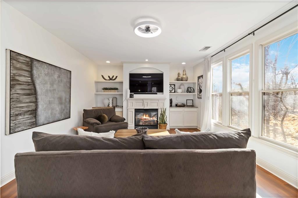 6233 Huntington Ridge Road Mableton, GA 30126 - Photo 8 of 50 a living room with furniture and a fireplace