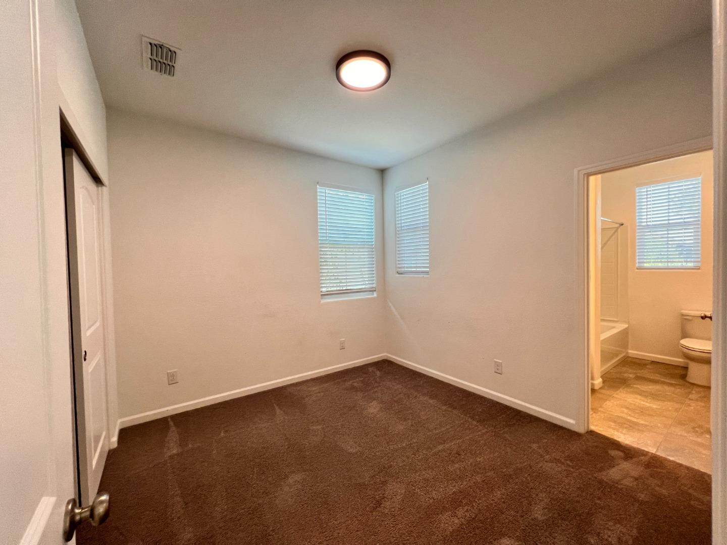 8362 Lemberger Way Sacramento, CA 95829 - Photo 16 of 28 an empty room with a window