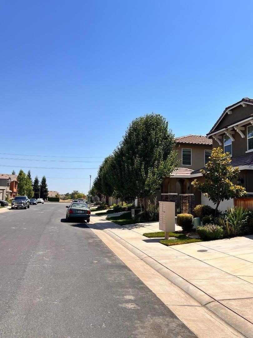 8362 Lemberger Way Sacramento, CA 95829 - Photo 28 of 28 a view of a street with a building in the background