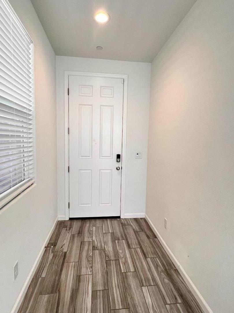 8362 Lemberger Way Sacramento, CA 95829 - Photo 3 of 28 a view of room with wooden floor