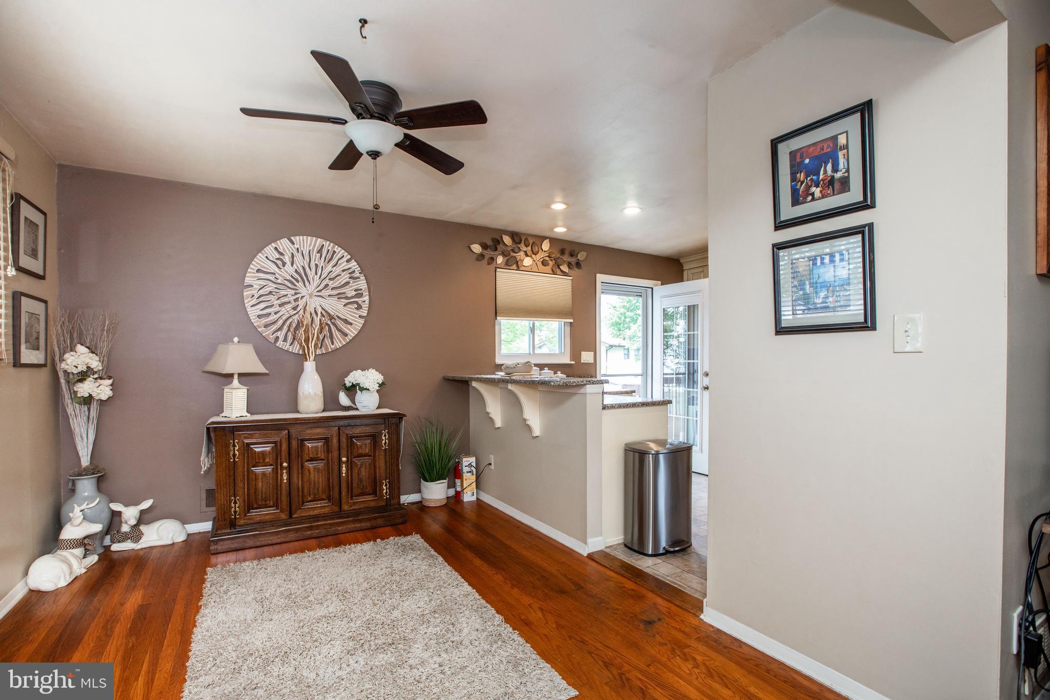 235 George Dye Road Hamilton, NJ 08690 - Photo 11 of 25 a view of a workspace with furniture and a ceiling fan