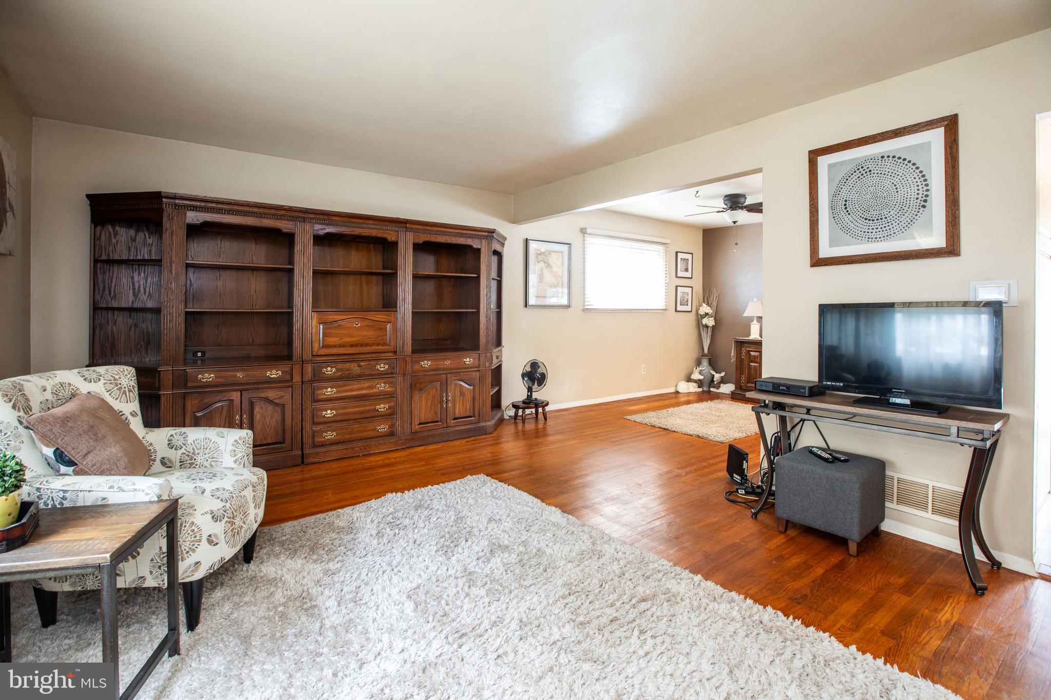 235 George Dye Road Hamilton, NJ 08690 - Photo 6 of 25 a living room with furniture and a flat screen tv