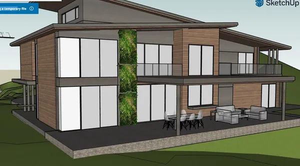 a view of a patio with a table and chairs and potted plants