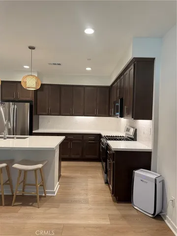 a living room with a couch and a flat screen tv