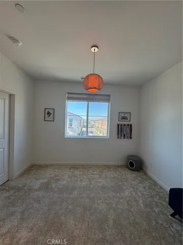 a view of empty room with windows