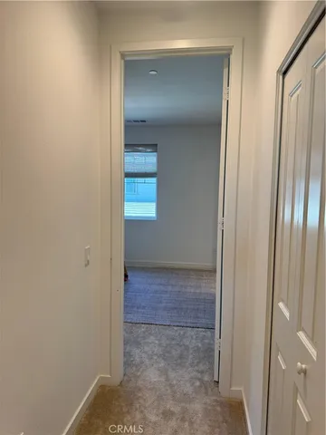 a view of a car park in front of a building