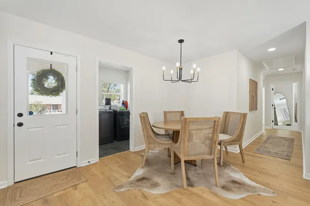 a view of a dining room with furniture