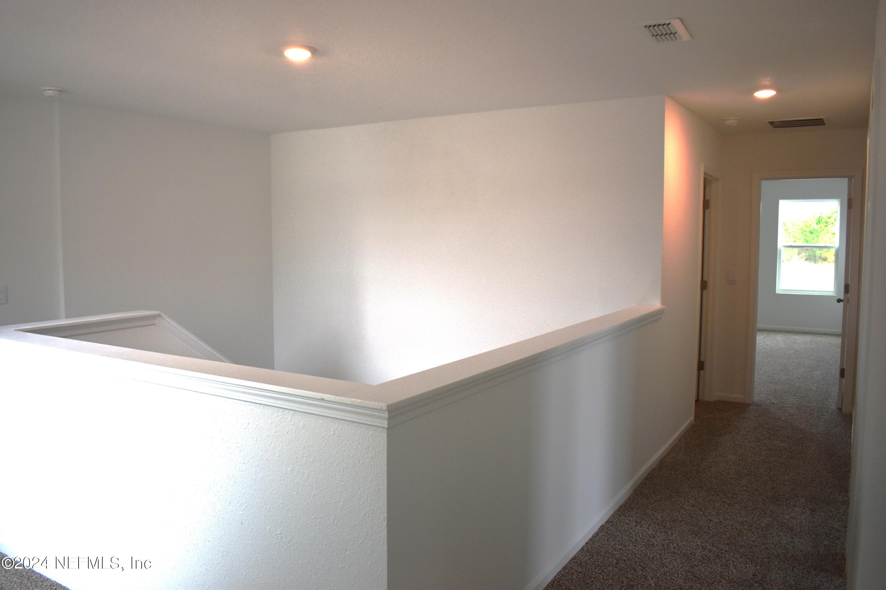 12732 European Beech Road Jacksonville, FL 32218 - Photo 18 of 28 O ARB 17 Top of Stairs