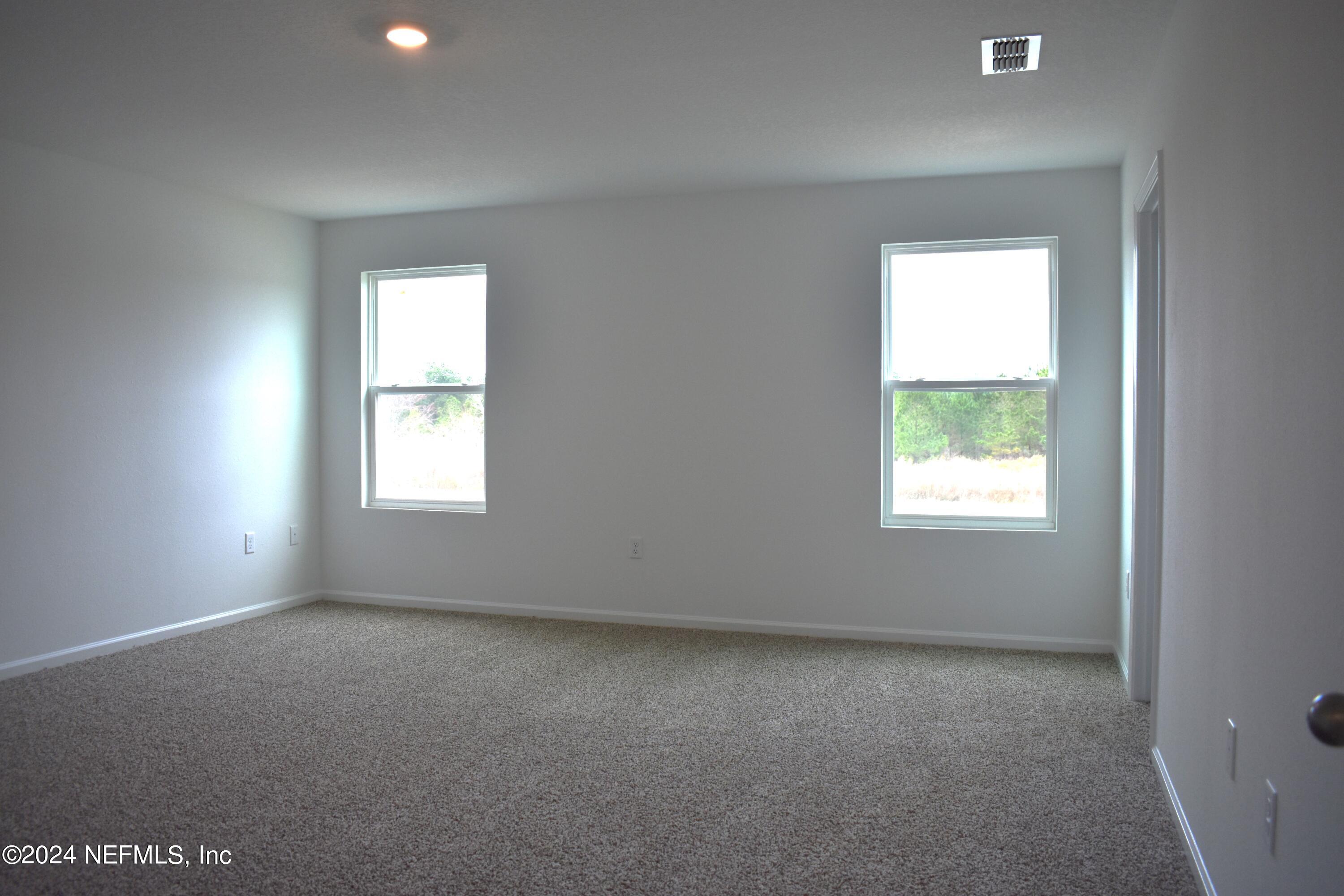 12732 European Beech Road Jacksonville, FL 32218 - Photo 21 of 28 Q ARB 17 Master Bedroom