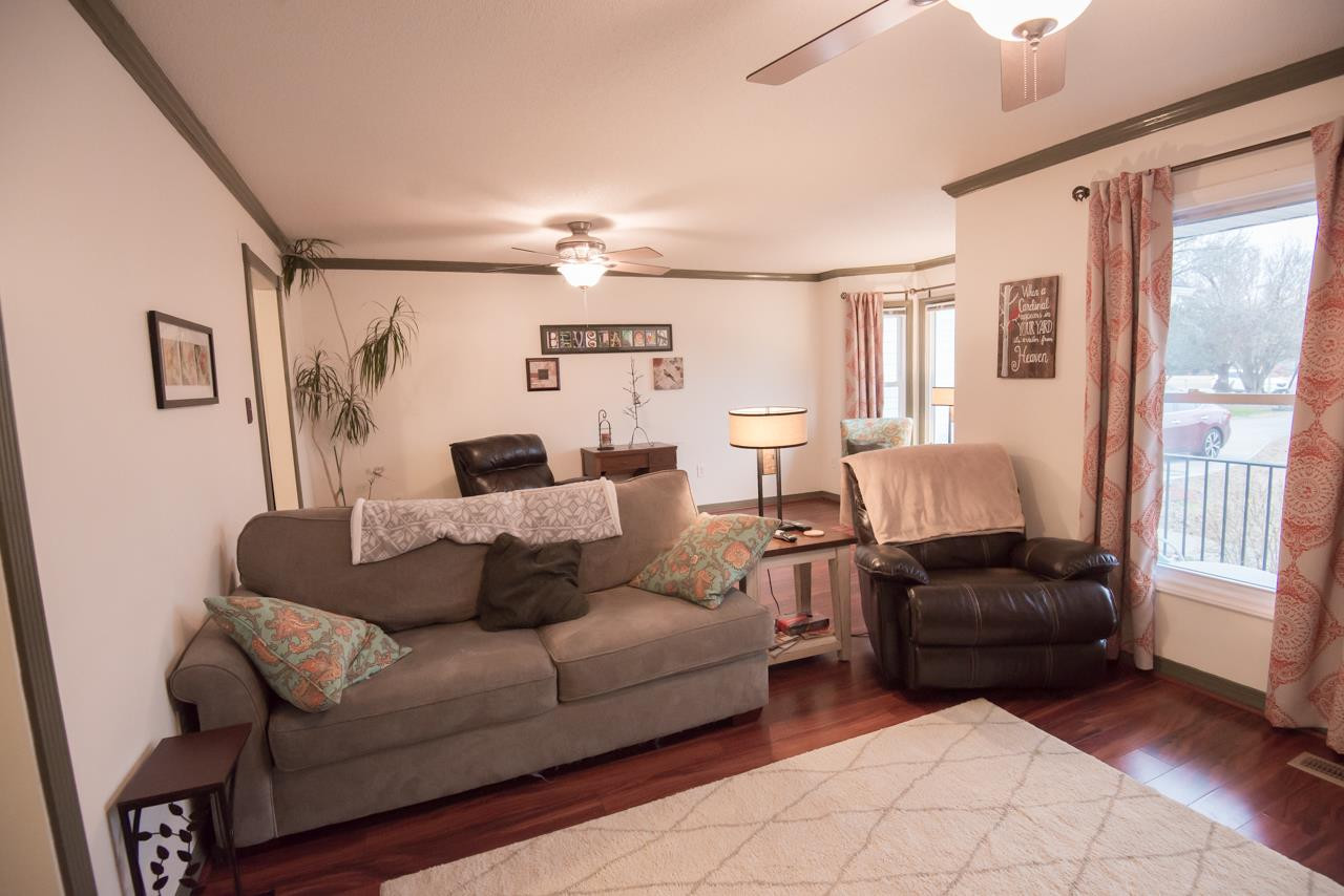 612 Canady Court Willow Spring, NC 27592 - Photo 8 of 24 this comfortable living room is great for reading, watching TV, or hanging out! Living Room