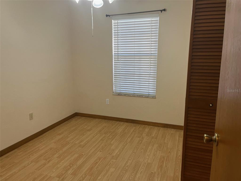 175 Conrad Street Port Orange, FL 32127 - Photo 12 of 13 a view of an empty room with a window