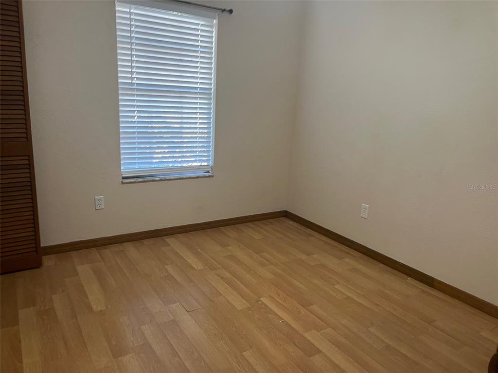 175 Conrad Street Port Orange, FL 32127 - Photo 13 of 13 an empty room with a window