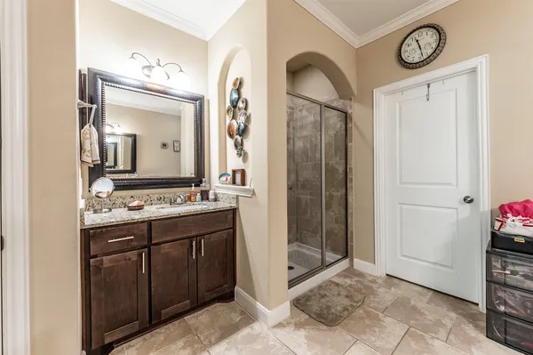 a bathroom with a bathtub and a sink