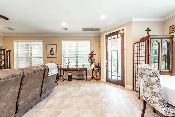 a living room with furniture and a window
