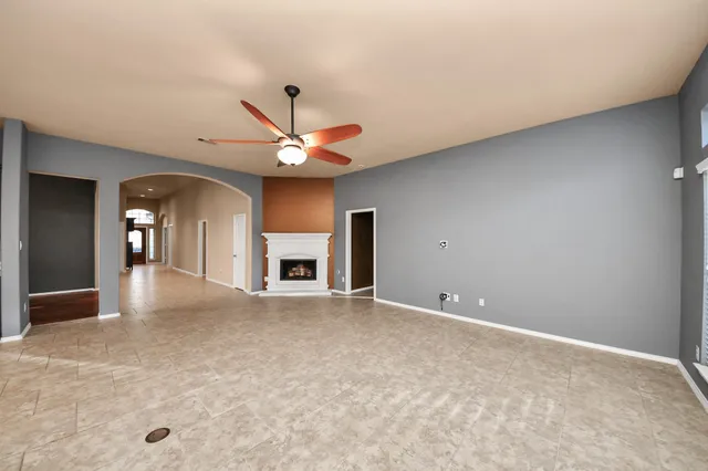 a view of kitchen with a sink and a stove top oven